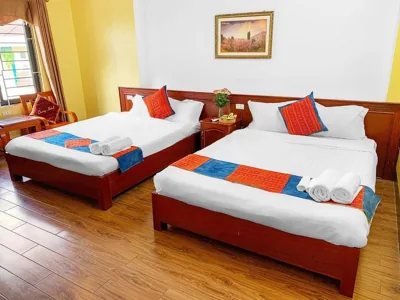 King Room with Two King Beds — Cherry Hotel